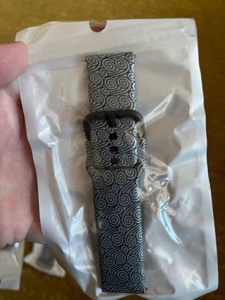 Correas de reloj multicolor y plateadas