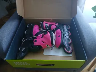 Patines en línea rosas y negros