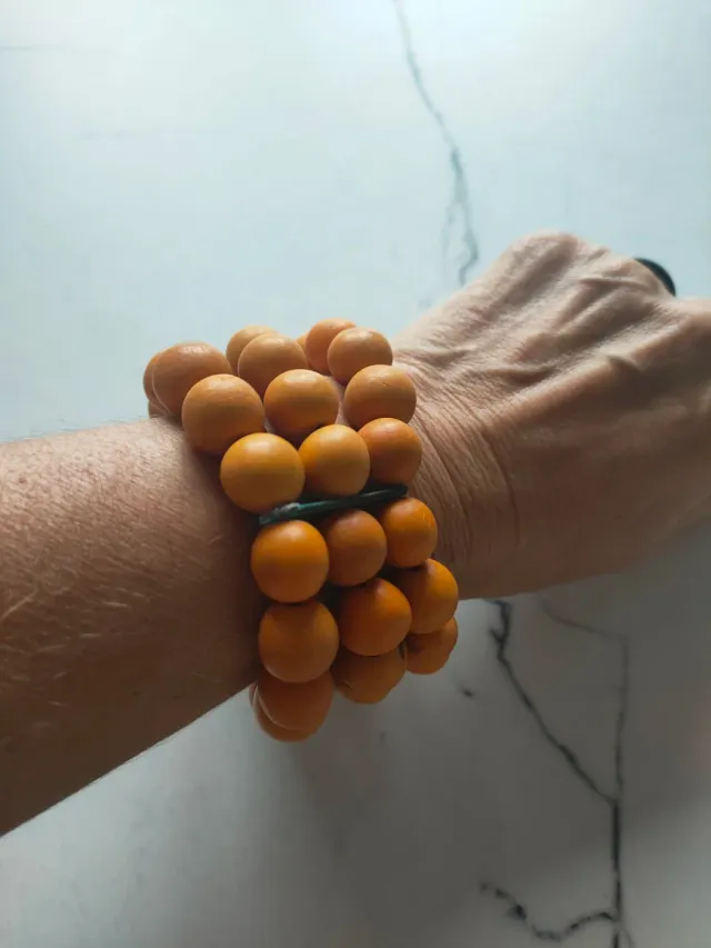 Braccialetto piccolo con perline arancioni