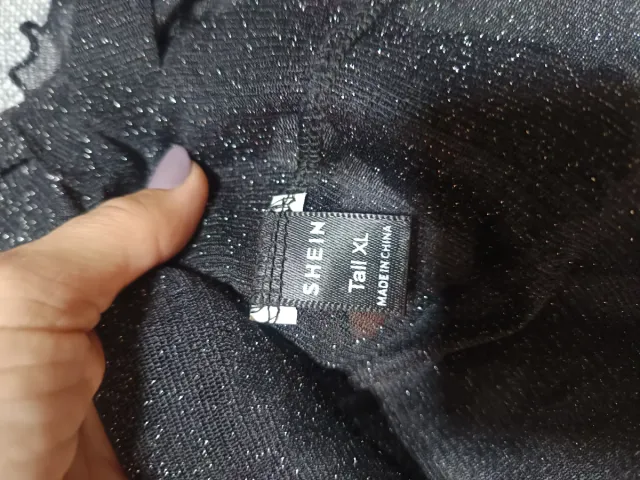 Top negro transparente con hilo plateado