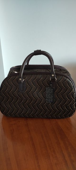 Bolso grande estampado..45 largo.30 alto.22 fondo.