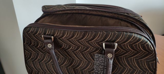 Bolso grande estampado..45 largo.30 alto.22 fondo.