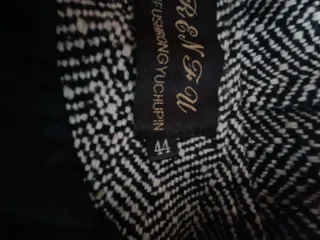 Chaquetón tweed con doble abotonadura