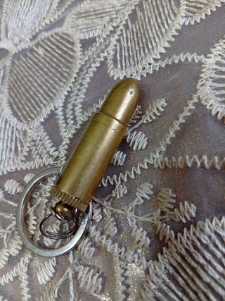 Accendino vintage a forma di proiettile