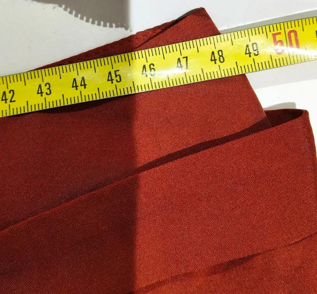 Shorts naranjas con cinturón