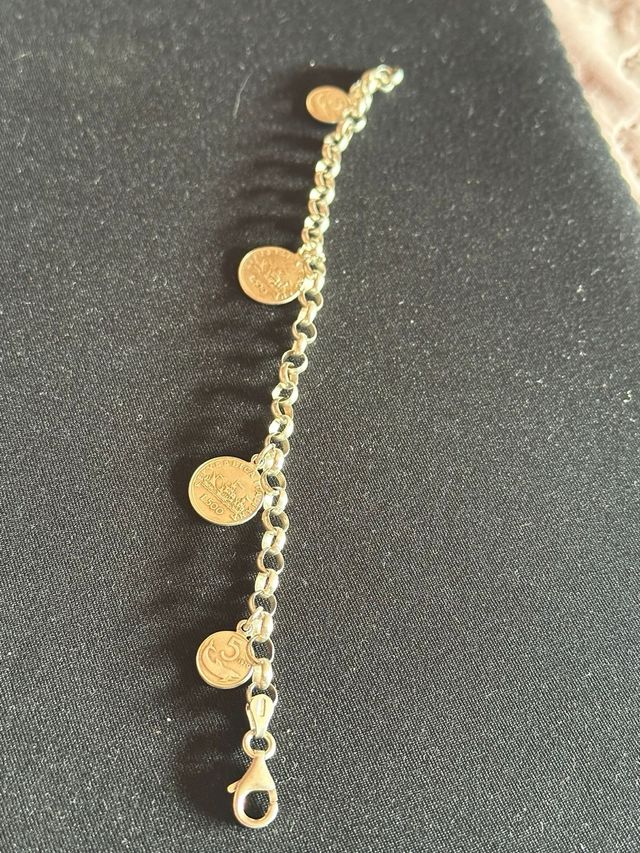 Pulsera de plata con monedas
