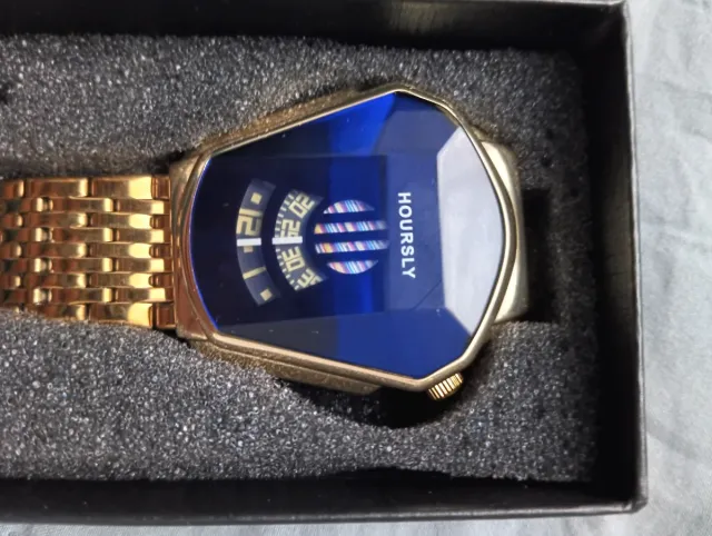 Reloj HOURLSY dorado con esfera azul