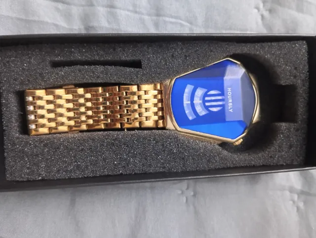 Reloj HOURLSY dorado con esfera azul