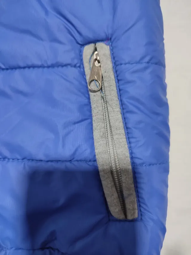 Chaleco Columbia reversible azul y gris para años 