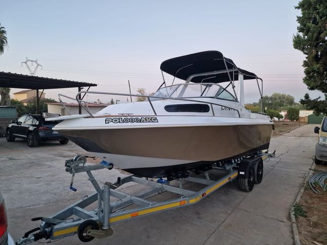 Barco con toldo y motor Honda