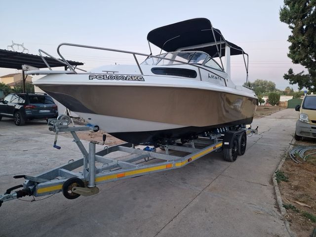 Barco con toldo y motor Honda