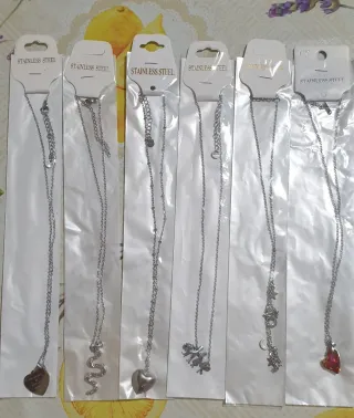 Lotto collane e braccialetti acciaio