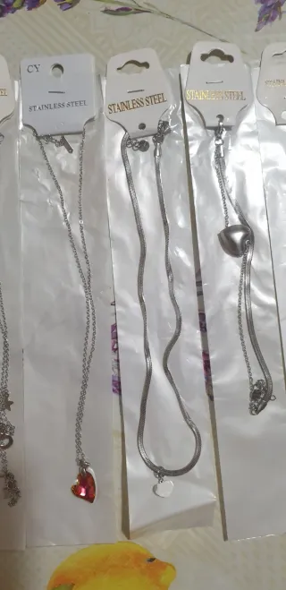 Lotto collane e braccialetti acciaio