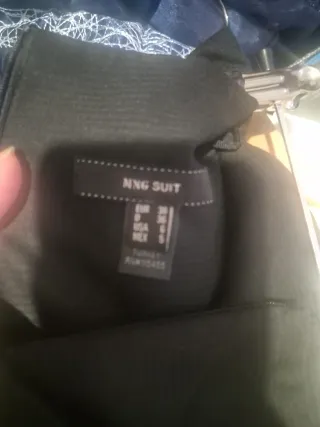 Falda negra con cinturón