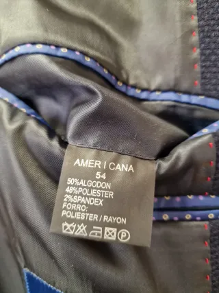 Americana azul con coderas