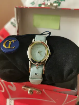 RELOJ PULSERA DE CUERO.