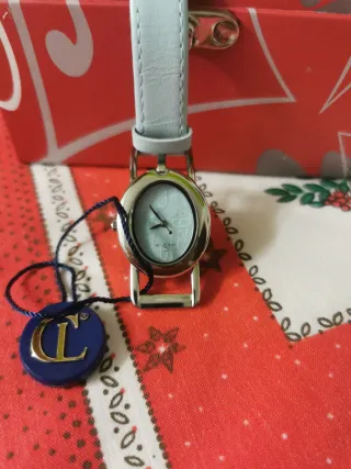 RELOJ PULSERA DE CUERO.