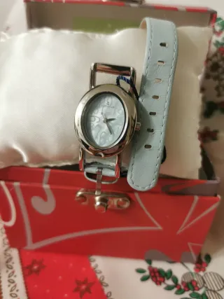RELOJ PULSERA DE CUERO.