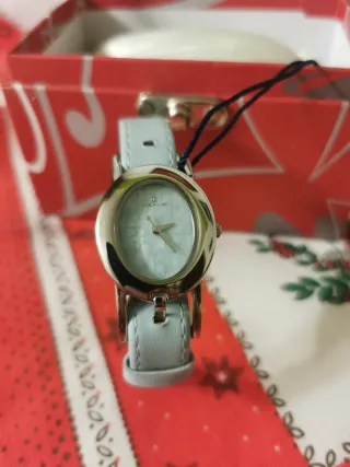 RELOJ PULSERA DE CUERO.