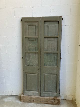 Vidriera madera maciza con postigos