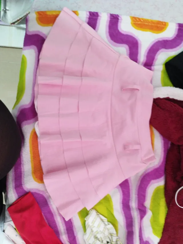 Falda rosa corta (sin cinturón)