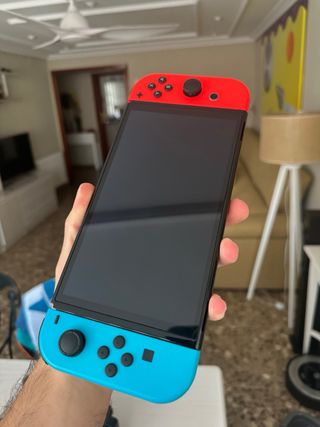 Nintendo Switch OLED Azul/Rojo + Accesorios