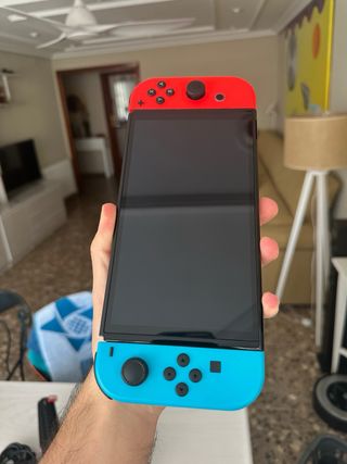 Nintendo Switch OLED Azul/Rojo + Accesorios