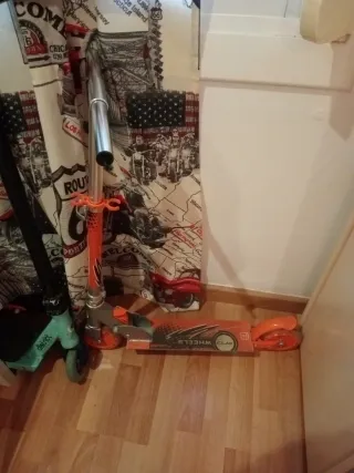 Patín de niño aluminio naranja Se regula