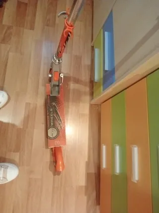 Patín de niño aluminio naranja Se regula