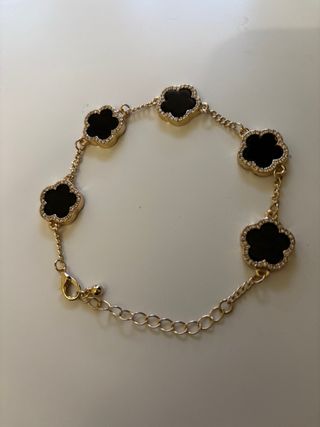 Pulsera Van Cleef Negra y Dorada