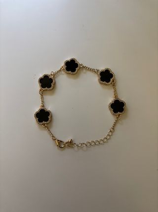 Pulsera Van Cleef Negra y Dorada