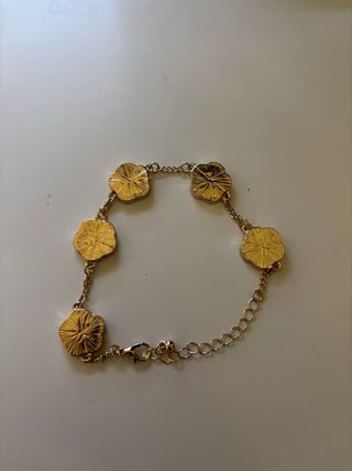 Pulsera Van Cleef Negra y Dorada