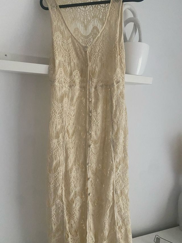 Chaleco boho de encaje beige