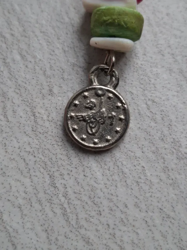 Orecchini con rondelle e charms