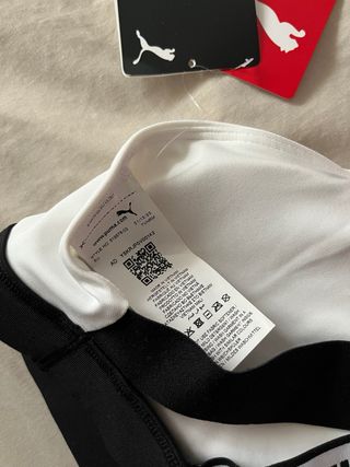Top deportivo Puma blanco y negro