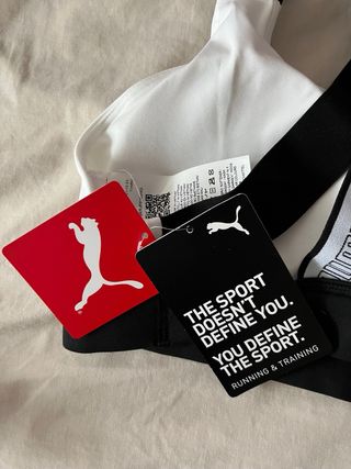 Top deportivo Puma blanco y negro