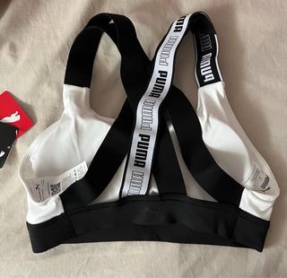 Top deportivo Puma blanco y negro
