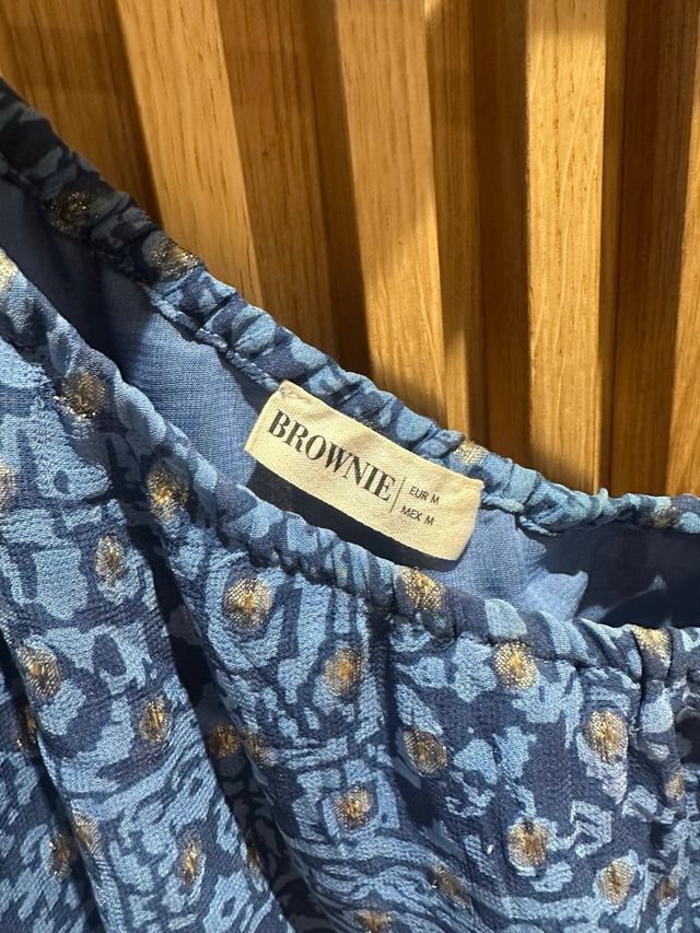 Camisa asimétrica Brownie azul y oro