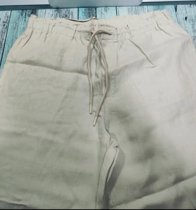 Pantalón beige Mango Talla L