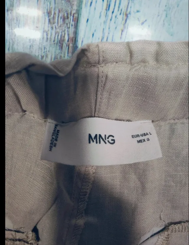 Pantalón beige Mango Talla L