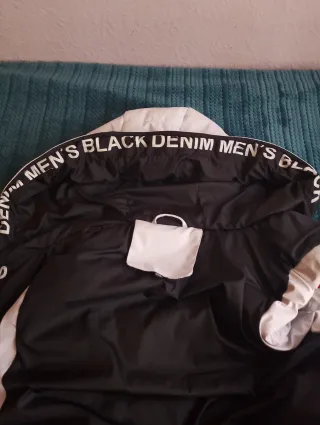 Plumífero Icon blanco y negro