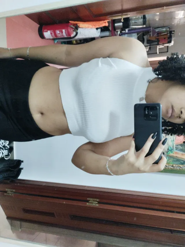 Top de lana blanco sin mangas