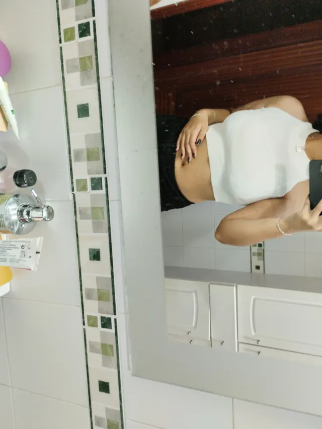 Top de lana blanco sin mangas