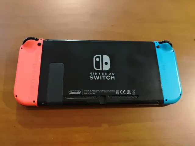 Nintendo Switch Azul y Rojo + Funda + 2 MicroSd