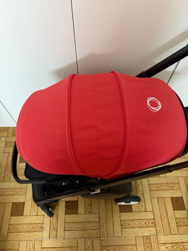Carrito Bugaboo Ant Rojo con saco y porta pie