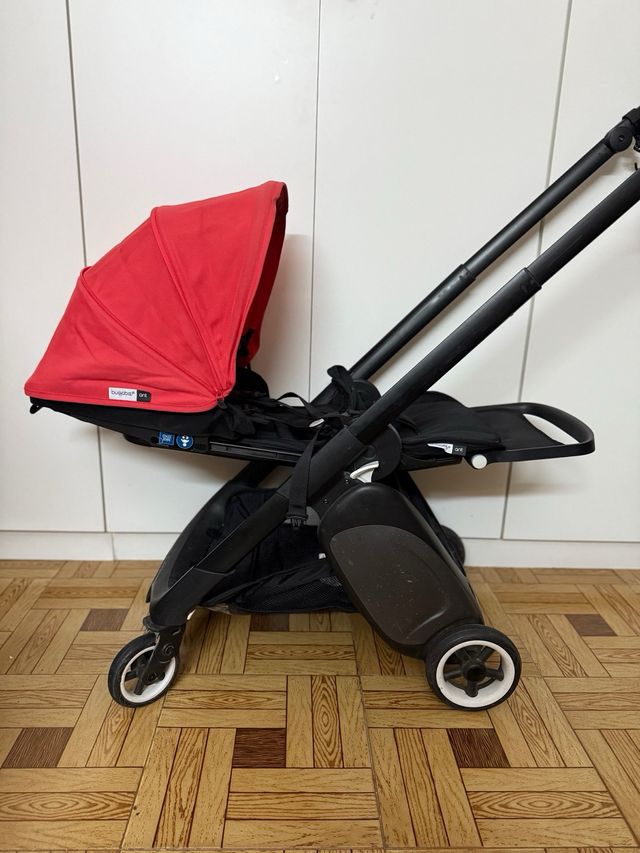 Carrito Bugaboo Ant Rojo con saco y porta pie