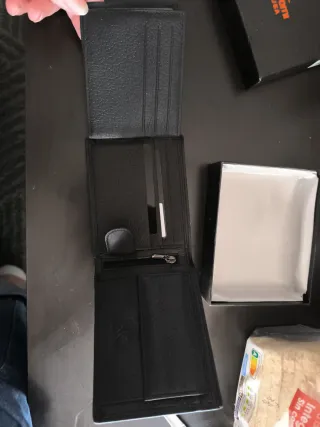 Cartera de piel negra para caballero