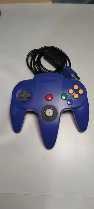Mando N64 con caja y papeles