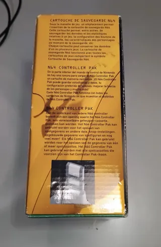 Mando N64 con caja y papeles