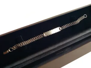 Esclava de plata con placa.largo 18 cm.